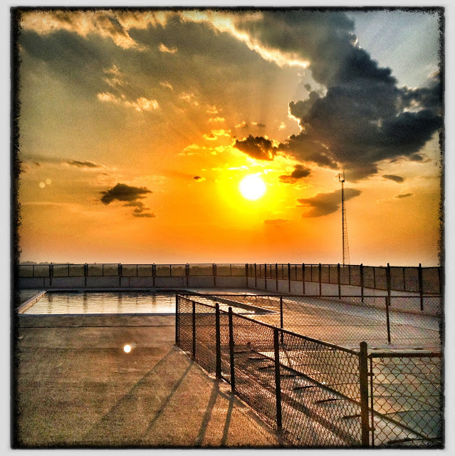 Sunset over my rooftop pool.... can't wait for summer!!